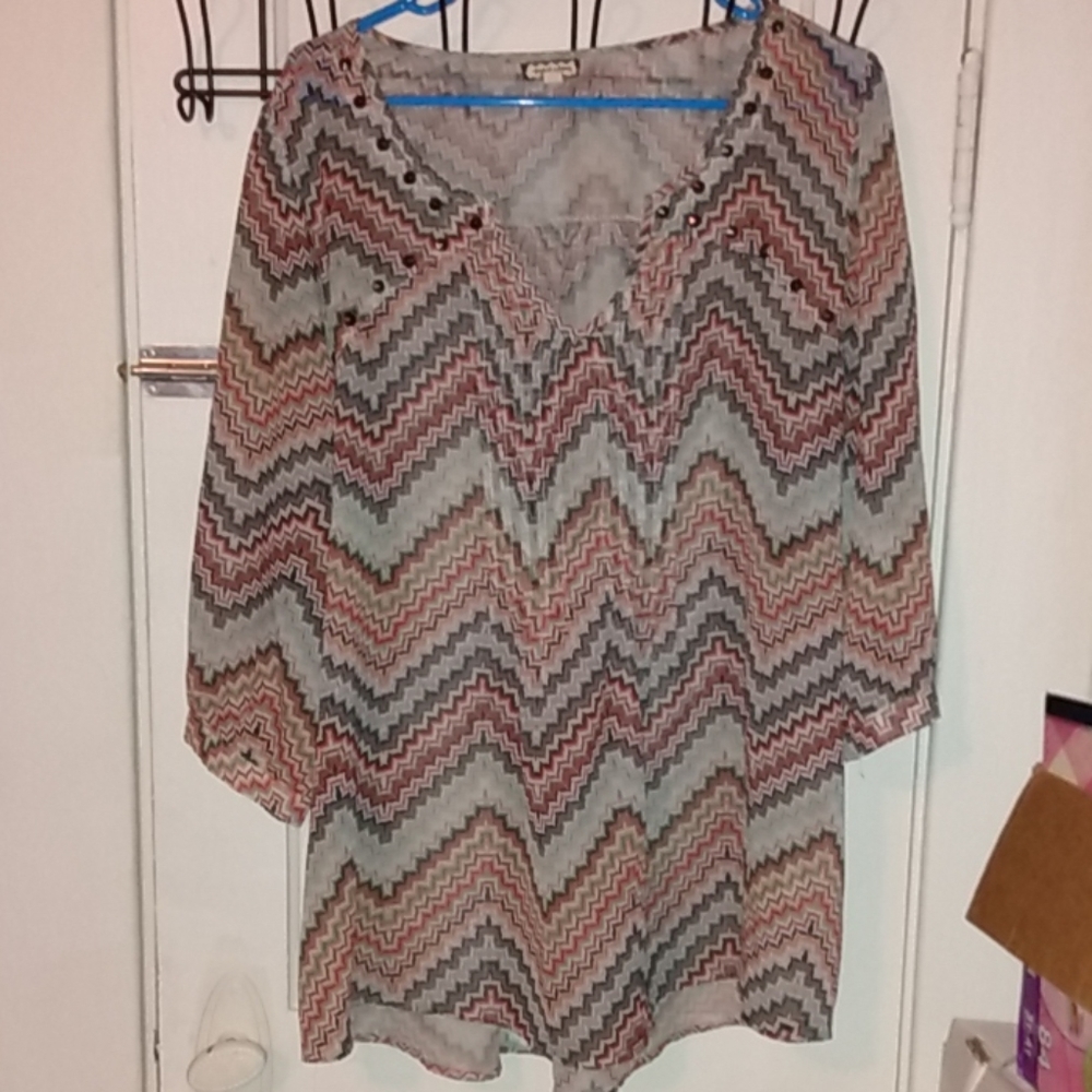 Flowy top with metal details on shoulders